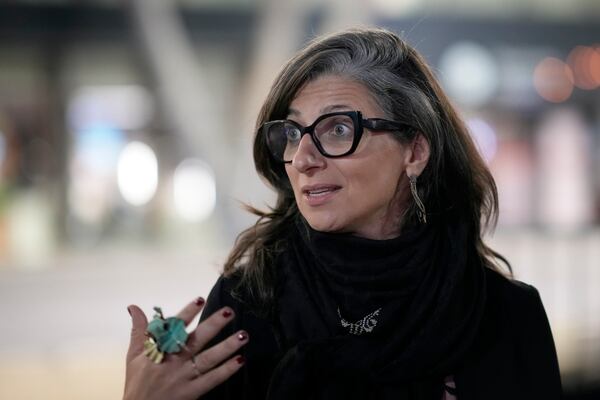 U.N. Special Rapporteur for the Occupied Palestinian Territories Francesca Albanese talks to The Associated Press at the Sarajevo airport in Sarajevo, Bosnia and Herzegovina, Thursday, July 10, 2025, on her way to events commemorating the 30th anniversary of the Srebrenica genocide. (AP Photo/Darko Bandic)