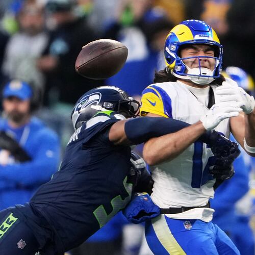 Seattle Seahawks safety Nick Emmanwori, left, breaks up a pass intended for Los Angeles Rams wide receiver Puka Nacua (12) during the first half of the NFC Championship NFL football game Sunday, Jan. 25, 2026, in Seattle. (AP Photo/Lindsey Wasson)