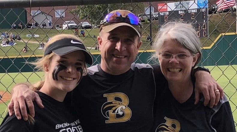 Kali Shultz (left) with her parents, Kevin and Belinda Shultz of Walnut Grove, after her first softball game at Brenau University. Kevin Shultz said his daughter is stable but needs our prayers. CONTRIBUTED