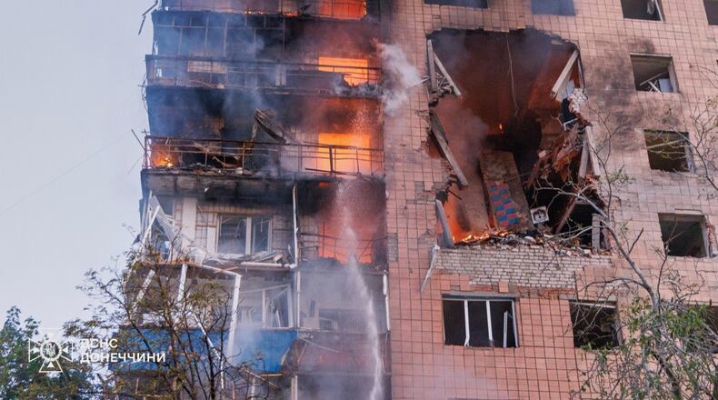 In this photo provided by the Ukrainian Emergency Service, a residential building is seen in fire following a Russian air attack in Kramatorsk, Donetsk region, Ukraine, Monday, July 20, 2026. (Ukrainian Emergency Service via AP)