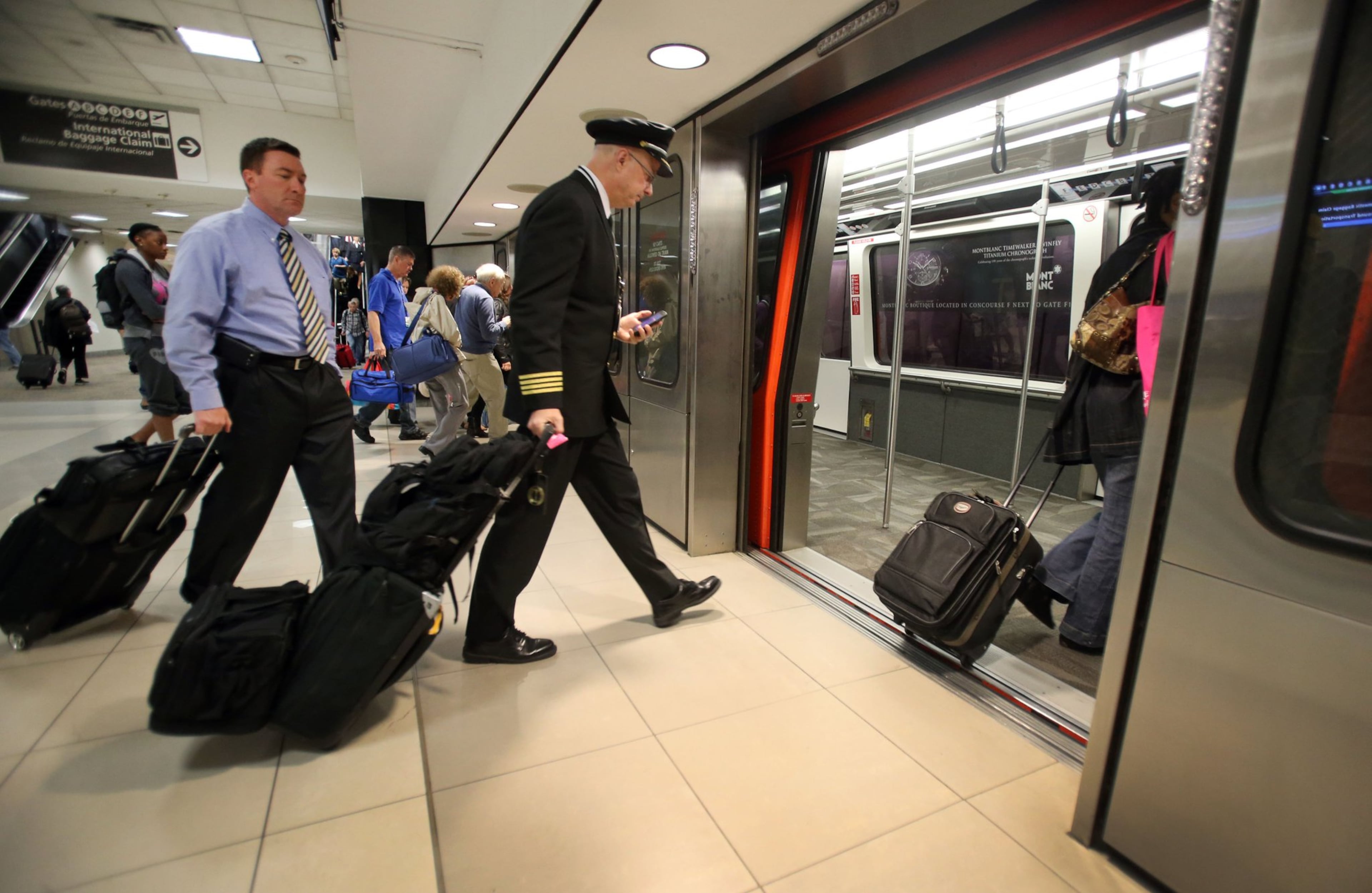Atlanta airport officials are pushing forward with plans to spend more than $300 million so that the underground systems of trains tying together terminals and concourses can handle more passengers at Hartsfield-Jackson Atlanta International Airport in 2016. JASON GETZ / AJC file