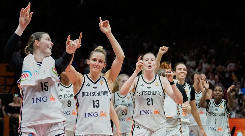 German players celebrate after the Women's Basketball World Cup match between the Germany and Mali in Berlin, Monday, Sept. 7, 2026. (AP Photo/Ebrahim Noroozi)