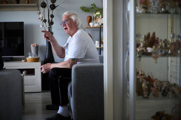Ben Buitenhuis, a 83-year-old surivor of the 1944-1945 Hunger Winter, reacts during an interview in Delft, Netherlands, Tuesday, April 29, 2025. (AP Photo/Peter Dejong)