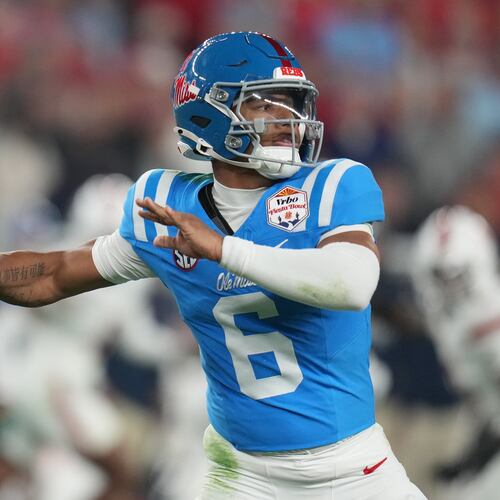 Mississippi quarterback Trinidad Chambliss throws during the first half of the Fiesta Bowl NCAA college football playoff semifinal game against Miami, Thursday, Jan. 8, 2026, in Glendale, Ariz. (AP Photo/Rick Scuteri)