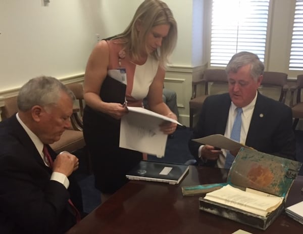 Georgia Building Authority Executive Director Steve Stancil, right, seen here with Gov. Nathan Deal, left, said the gun control activists did not follow proper procedures for the use of power at Liberty Plaza. JAMES SALZER / JSALZER@AJC.COM