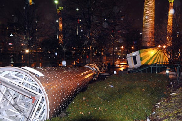 One of the large decorative lights surrounding Centennial Olympic Park is shown blown over and destroyed in 2008. Downtown Atlanta and the surrounding areas were hit by a storm and tornado, and property damage was extensive. (David Tulis/AJC 2020)
