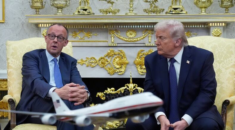FILE - President Donald Trump meets with German Chancellor Friedrich Merz in the Oval Office at the White House, March 3, 2026, in Washington. (AP Photo/Mark Schiefelbein, File)