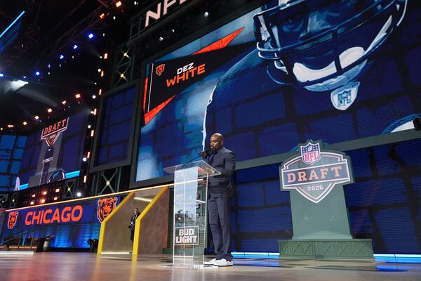 Former NFL player Dez White announces a draft pick for the Chicago Bears during the second round of the NFL football draft, Friday, April 25, 2025, in Green Bay, Wis. (AP Photo/Jeff Roberson)
