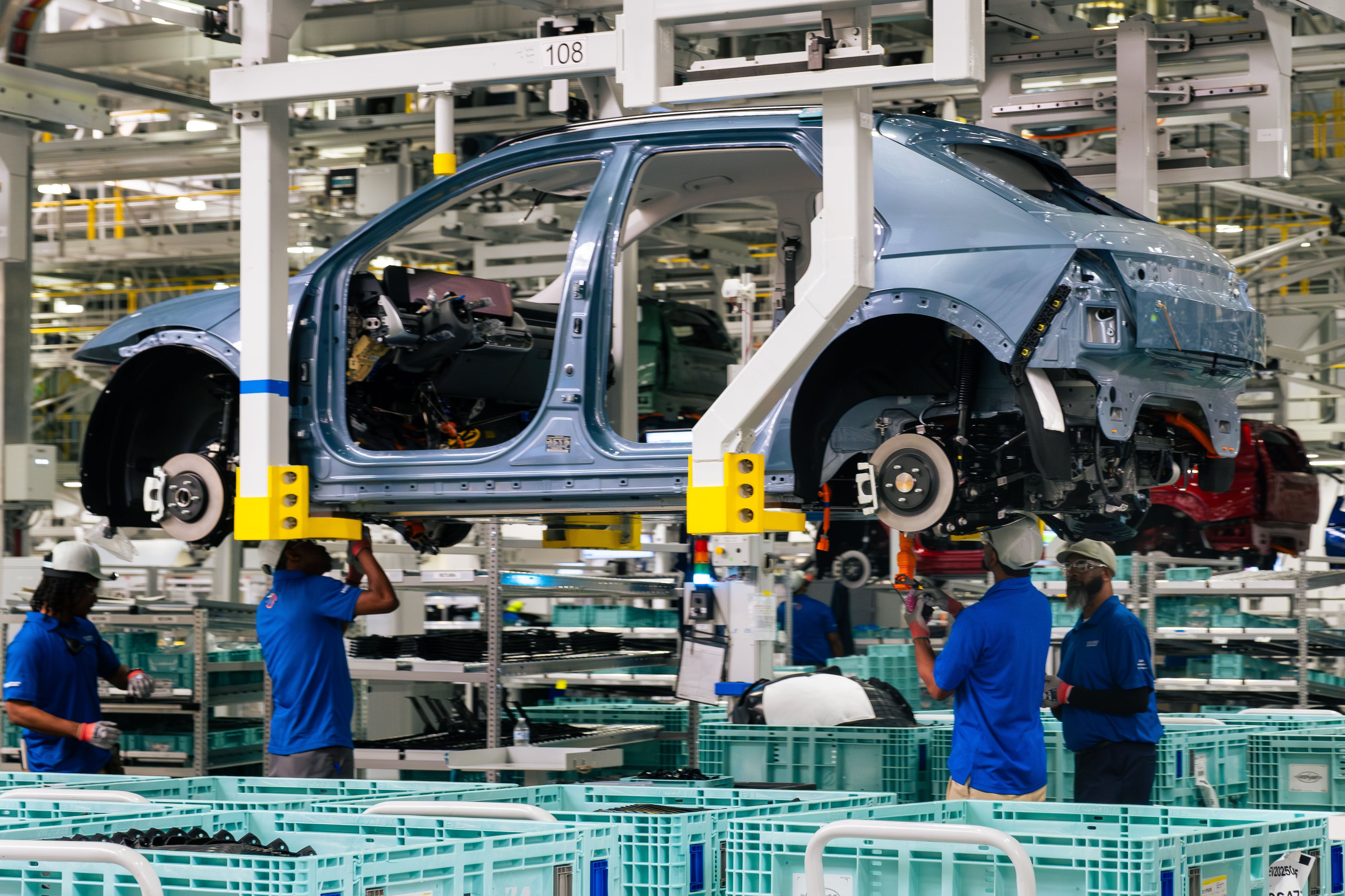 Metapros assemble parts on the IONIQ 5 electric car at the Hyundai Metaplant in Bryan County, Ga., on Wednesday, March 26, 2025. (Justin Taylor/The Current GA)