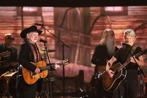 FILE - Willie Nelson, left, and Kris Kristofferson perform on stage at the 56th annual Grammy Awards on Jan. 26, 2014, in Los Angeles. (Photo by Matt Sayles/Invision/AP, File)