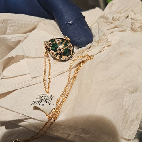In this photo provided by the New Zealand Police a Fabergé pendant is held after it was recovered, Thursday, Dec. 4, 2025, from a man accused of stealing and swallowing the pendant. (New Zealand Police via AP)