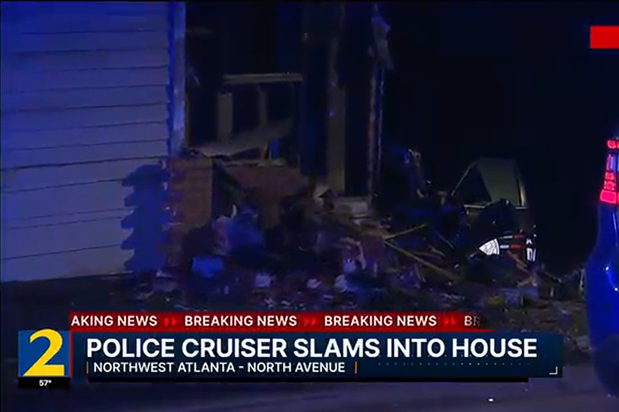 An Atlanta police officer, en route to a call for help from another officer, crashed into the back of a house near the Bankhead neighborhood late Monday. (Channel 2 Action News)