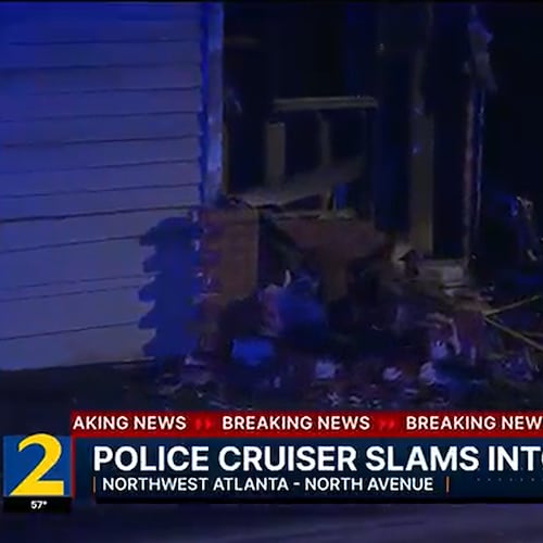 An Atlanta police officer, en route to a call for help from another officer, crashed into the back of a house near the Bankhead neighborhood late Monday. (Channel 2 Action News)
