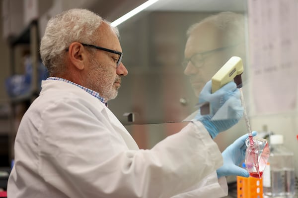 Arban Domi, GeoVax's director of vaccine development, works in the firm's Smyrna laboratory.