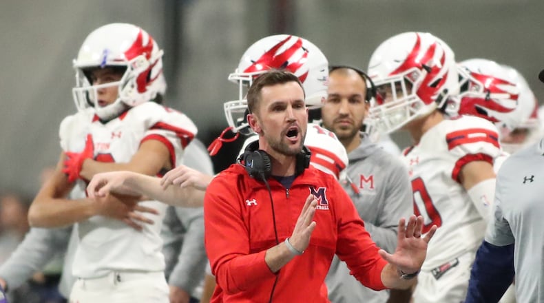 December 12, 2018 - Atlanta, Ga: Milton coach Adam Clack reacts on the sideline in the first half against Colquitt County during the Class AAAAAAA State Championship at Mercedes-Benz Stadium Wednesday, December 12, 2018, in Atlanta. (JASON GETZ/SPECIAL TO THE AJC)