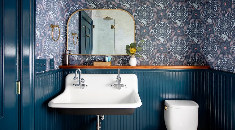Grow House Grow's "Fauna Fantasia" wallpaper creates a contrast with the painted panels. Photo: Courtesy of Grow House Grow / Margaret Wright