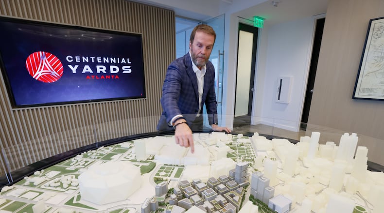 Brian McGowan, President of Centennial Yards, points to the 3D model of a significant development project underway in downtown Atlanta next to Mercedes-Benz Stadium.
Miguel Martinez /miguel.martinezjimenez@ajc.com
