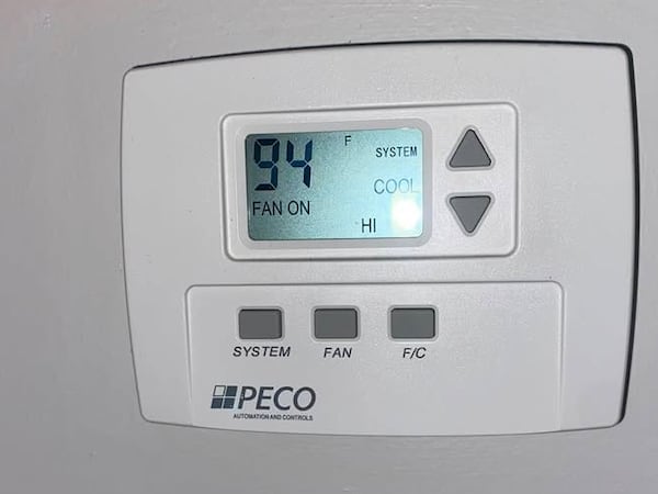 During a sustained electrical outage at Howard University, student Jessica Parker said she and her peers had to take cold showers while enduring temperatures that she described as sauna-like. The thermostat shows temperatures hit 94 degrees in the dorm in March. (Courtesy of Jessica Parker)