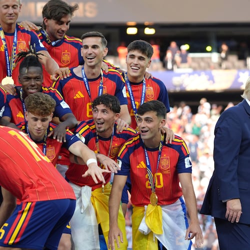 Spain players, from left, cheer alongside President Donald Trump and FIFA President Gianni Infantino at the conclusion of the World Cup championship final soccer match between Spain and Argentina in East Rutherford, N.J., Sunday, July 19, 2026. (AP Photo/Jacquelyn Martin)