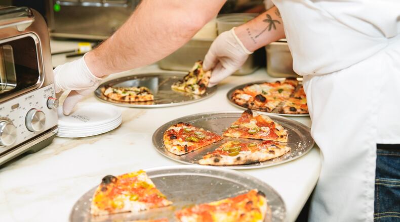 Head to Ponce City Market for $1 pizza samples today.