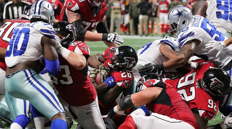 November 12, 2017 Atlanta : Falcons running back Tevin Coleman just gets into the endzone for a 10-7 lead over the Cowboys during the second quarter in a NFL football game on Sunday, November 12, 2017, in Atlanta.    Curtis Compton/ccompton@ajc.com