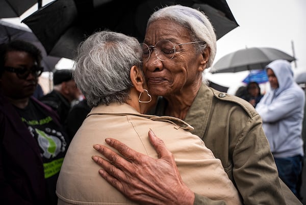 Amina Baraka, mother of Newark Mayor Ras J. Baraka, hugs Rep. Bonnie Watson Coleman, D-N.J., outside of an ICE office after her son's arrest, Friday, May 9, 2025, in Newark, N.J. (AP Photo/Angelina Katsanis)