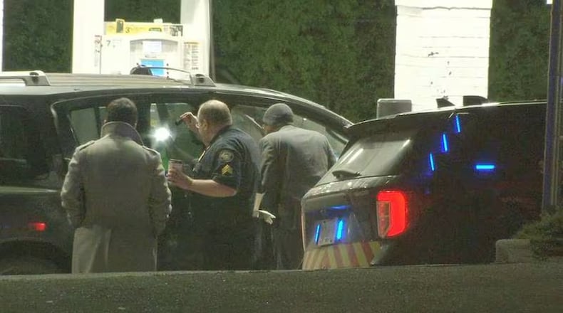 A woman was found dead inside an SUV at a BP station on Cleveland Avenue in southwest Atlanta.