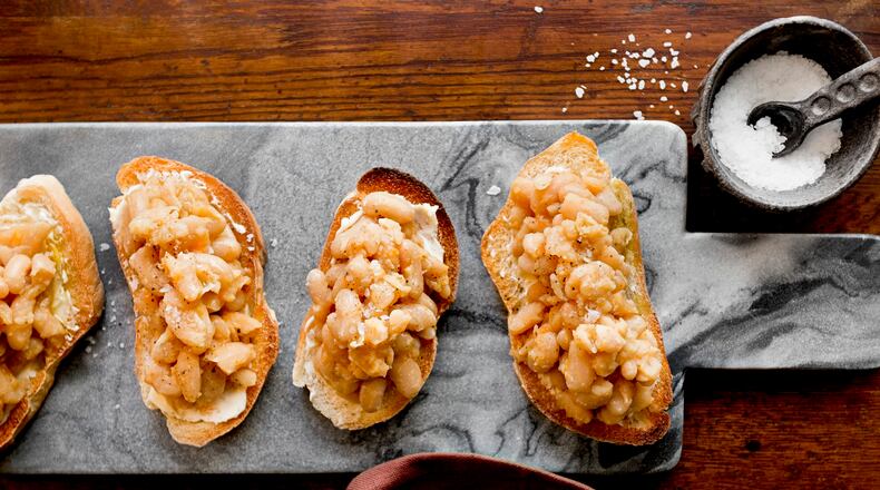 An undated photo of simple beans on toast, adapted from a Steve Sando recipe. Cookbook author Marcella Hazan’s connection with specialty-food purveyor Steve Sando resulted in an unlikely honor -- the naming of a type of bean that Sando raised after her.