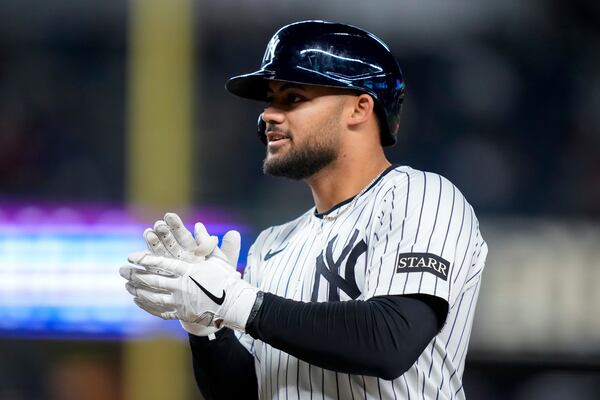 New York Yankees' Jasson Domínguez reacts after singling on a line drive during the fourth inning of a baseball game against the Arizona Diamondbacks, Tuesday, April 1, 2025, in New York. (AP Photo/Julia Demaree Nikhinson)