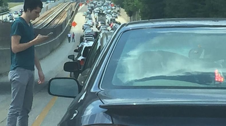 A collision involving a wrong-way driver had all southbound lanes of Ga. 400 closed Sunday morning. (Credit: Channel 2 Action News)