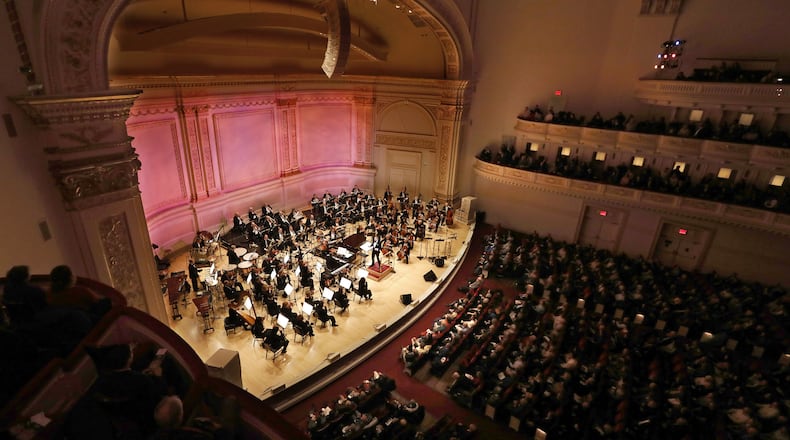 Carnegie Hall was nearly sold out for a performance by The New York Pops, conducted by Steven Reineke. Historic Carnegie Hall was built by philanthropist Andrew Carnegie in 1891 and designed by architect William Burnet Tuthill. The main hall seats 2,804 on five levels and was extensively renovated in 1986. (Carolyn Cole/Los Angeles Times/TNS)