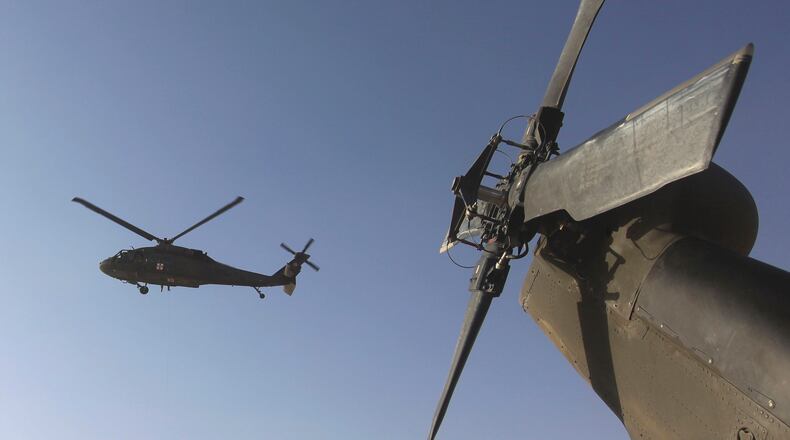 Six U.S. troops and two international officials reportedly have died after a U.S. Army Black Hawk helicopter (similar to the one shown) crashed Thursday off the coast of Egypt, American Military News reported. (AP Photo/Rafiq Maqbool, File)