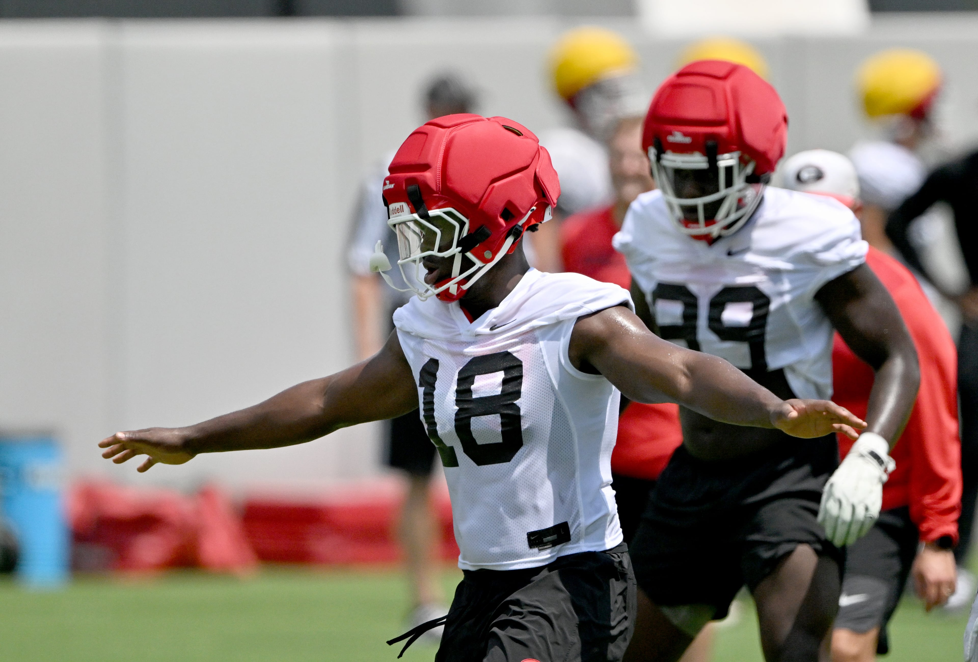 Georgia defensive back Jontae Gilbert (18) runs a drill during a football practice at the University of Georgia practice facility, Thursday, July 31, 2025, in Athens. (Hyosub Shin / AJC)