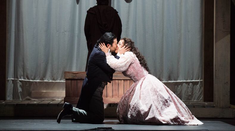 Jesus Leon and Nicole Cabell perform as Romeo and Juliet in the Atlanta Opera’s production of Charles Gounod’s “Romeo and Juliet,” which runs at the Cobb Energy Performing Arts Centre through May 15. The production sets the story in the 19th century and imagines the Capulets as a family of aristocrats and the Montagues as a family of actors. CONTRIBUTED BY JEFF ROFFMAN