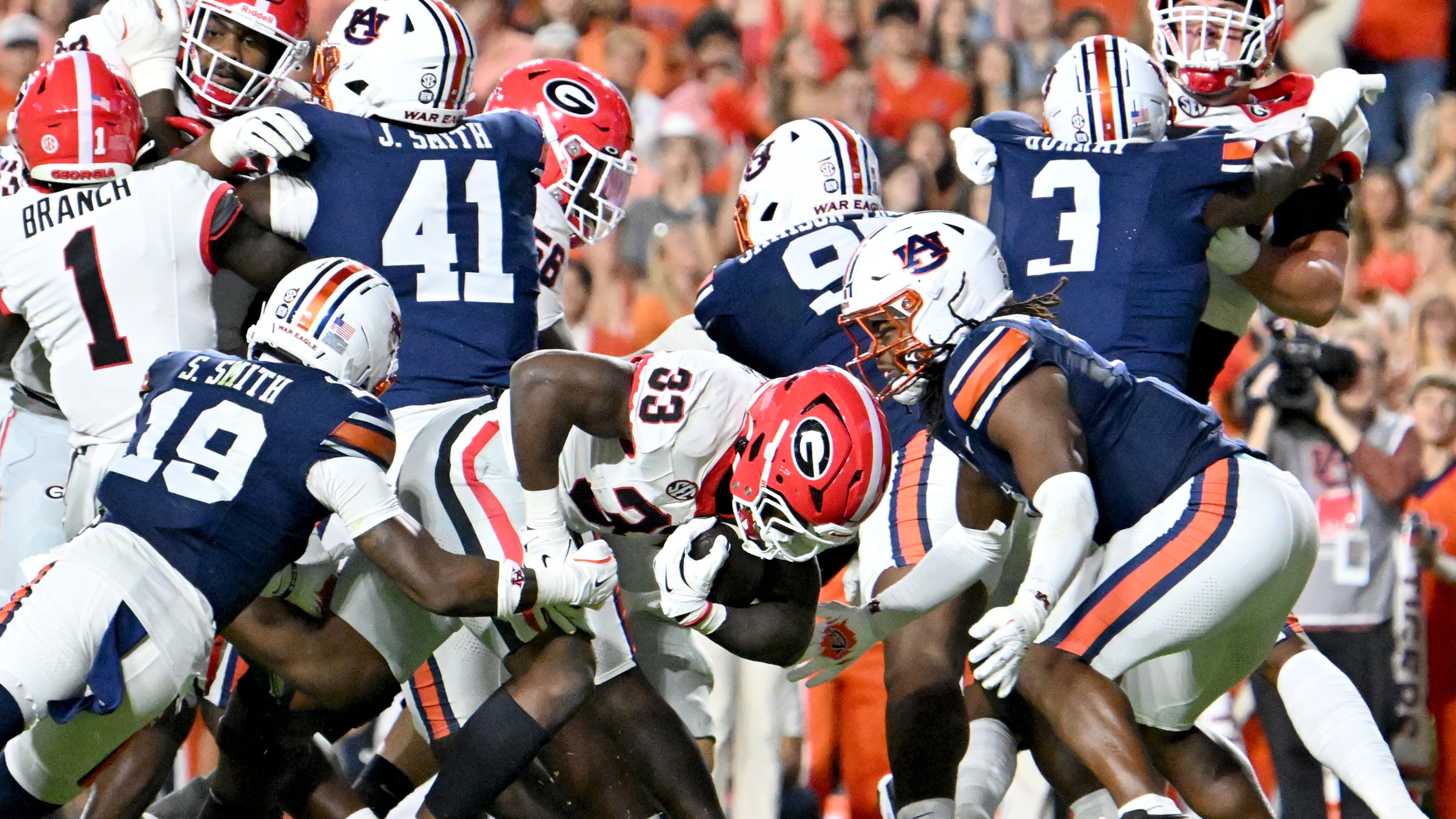 Ole Miss has a dangerous offense, but Georgia hope its improving defense can hold up against it while the Bulldogs' run-heavy offense could gash the Rebels' struggling run defense. (Hyosub Shin/AJC)