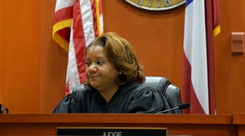 JURY SENT HOME--October 9, 2014 DeKalb: Judge Courtney Johnson addresses the jury Thursday October 9, 2014. Johnson dismissed the jury early after jurors complained of conflict issues among themselves. The jury is still deliberating the fate of suspended DeKalb county CEO Burrell Ellis. Ellis is fighting charges that he intimidated companies doing business with DeKalb County into giving him campaign contributions. BRANT SANDERLIN / BSANDERLIN@AJC.COM