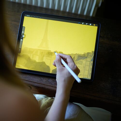 Illustrator Marina Antonova works on a drawing for her series called "Chronicles of a Heating Planet" in Beaumont-les-Valence, southern France, on Sept. 12, 2026. (AP Photo/Laurent Cipriani)
