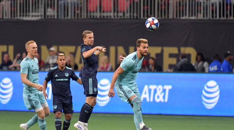April 20, 2019 Atlanta - Atlanta United defender Leandro Gonzalez (5) heads the ball during MLS soccer match at Mercedes-Benz Stadium in Atlanta on Wednesday, April 20, 2019. HYOSUB SHIN / HSHIN@AJC.COM