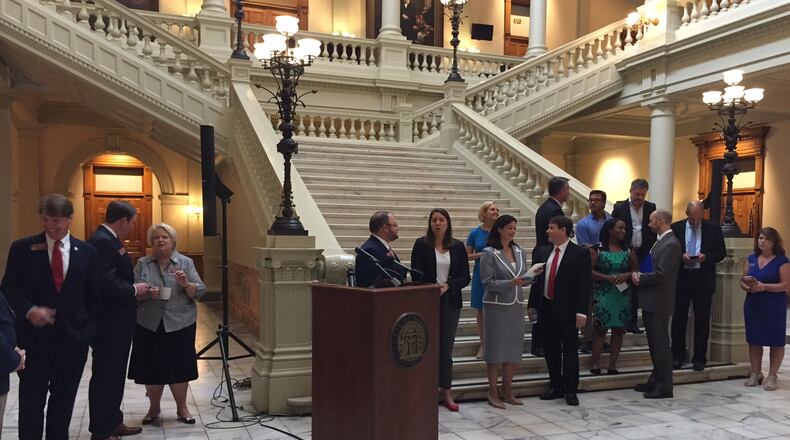 Legislators, attorneys and adults who say they were sexually abused as children gathered Wednesday for a news conference at the Georgia Capitol. ALAN JUDD/ajudd@ajc.com