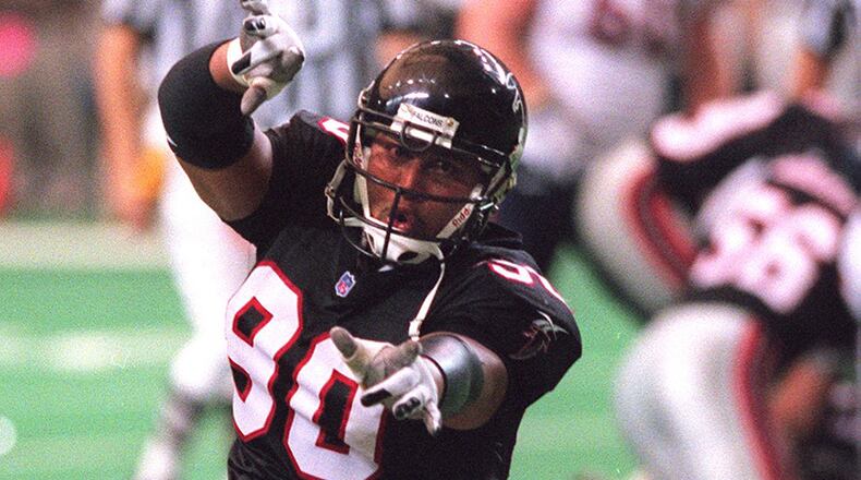 Former Falcons defensive end Chuck Smith, who’s been training some of the top defensive linemen preparing for the NFL draft in recent years, signed a contract Tuesday to be the outside linebackers coach for the Ravens. (John Glenn/AJC file photo)