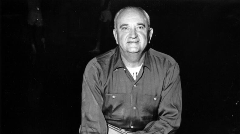 Kentucky's basketball coach Adolph Rupp won 82 percent of his games, four NCAA titles and 27 SEC championships. (AP file photo)