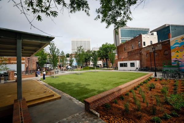 The Founders Green is a space created to bring the community together as part of the South Downtown Atlanta revitalization, as seen on Wednesday, May 27, 2026. More than 50 historic buildings are being restored to include retail spaces and residences in one of Atlanta’s most ambitious downtown projects. (Miguel Martinez/AJC)