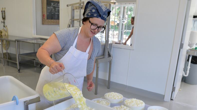 Many Fold Farm owner Rebecca Williams makes cheese from sheep milk in 2014. / AJC file photo
