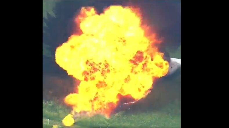 Video footage shown on FS1 shows the blimp catching fire upon hitting the ground about half mile for the U.S. Open golf course in Erin, Wisc.