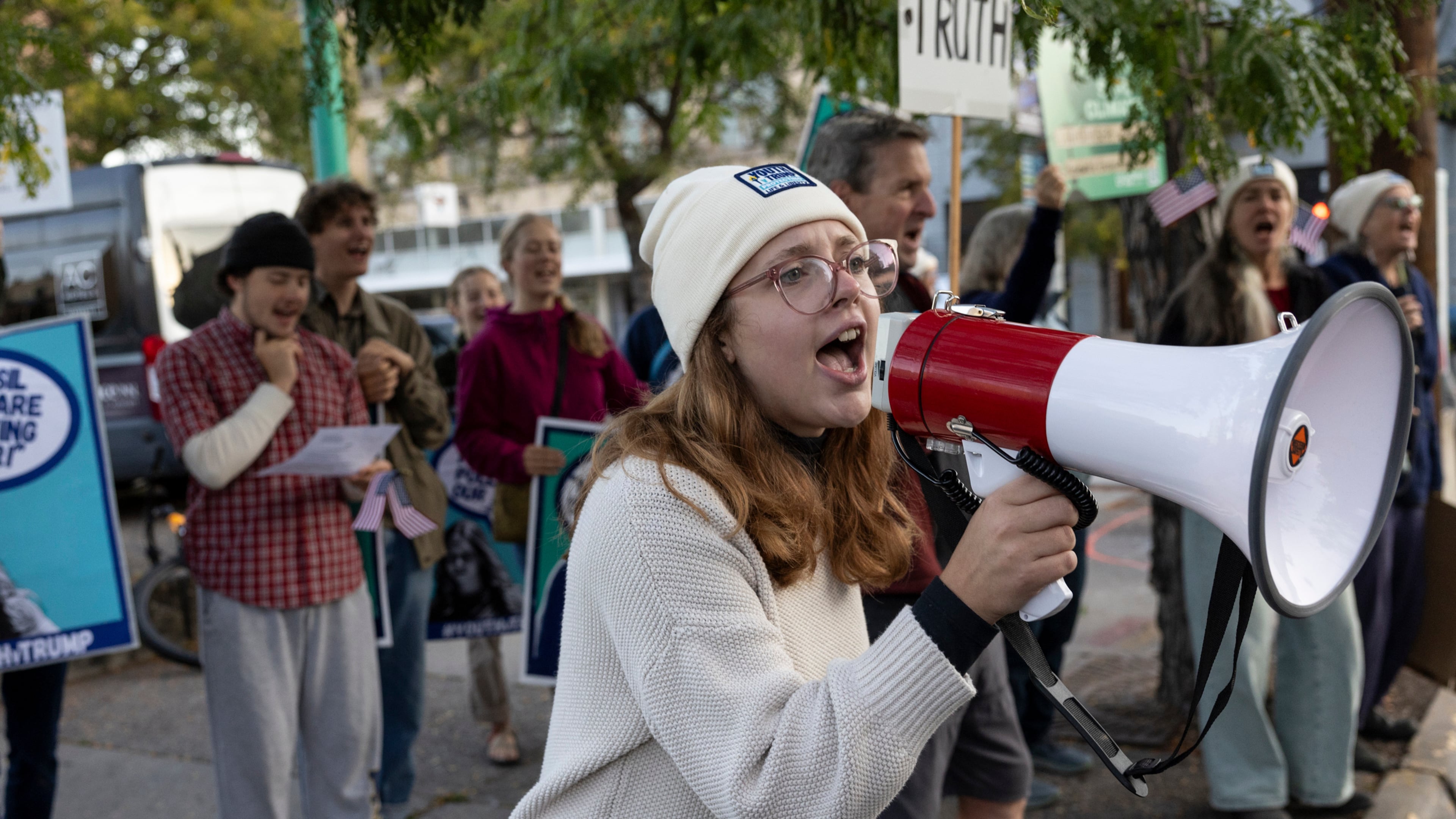 University of Montana student Maddie Grebb leads a chant across the street from the Russell Smith federal courthouse, where young climate activists were in court challenging President Donald Trump's orders promoting fossil fuels, Sept. 17, 2025, in Missoula, Montana. (Ben Allan Smith/The Missoulian via AP)