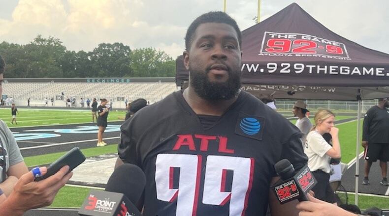 Falcons defensive tackle Eddie Goldman talking to the media after practice at Seckinger High School on Saturday, July 27, 2024.