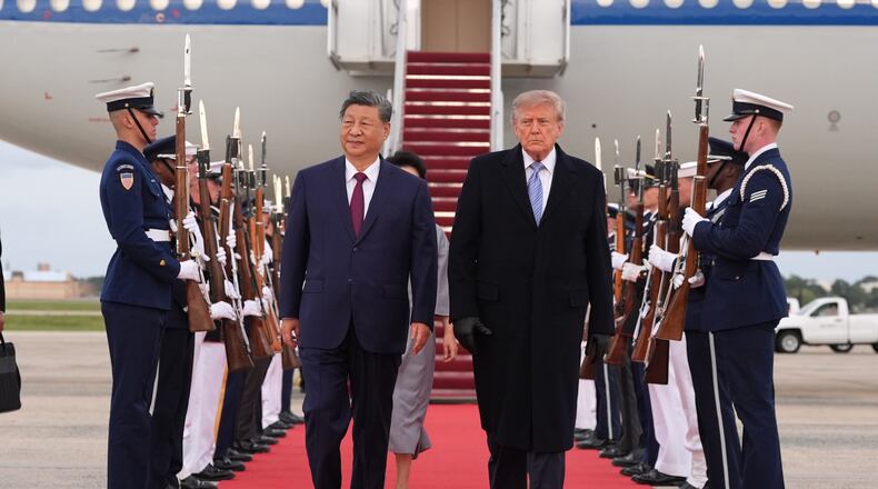 President Donald Trump and first lady Melania Trump walk with China's President Xi Jinping and his wife Peng Liyuan at Joint Base Andrews, Md., Wednesday, Sept. 23, 2026.(AP Photo/Alex Brandon)