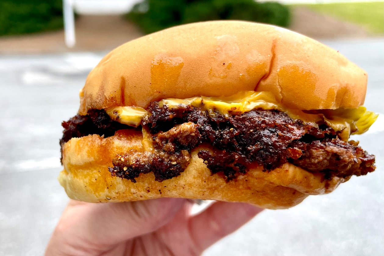 The Classic Double is available at NFA Burger inside a Dunwoody Chevron station. A second, full-service location will soon open at Avalon in Alpharetta. (Angela Hansberger for the AJC)