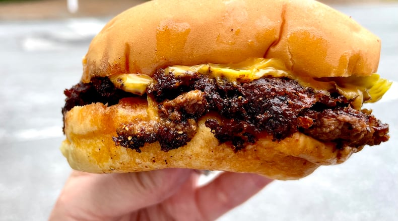 The Classic Double is available at NFA Burger inside a Dunwoody Chevron station. A second, full-service location will soon open at Avalon in Alpharetta. (Angela Hansberger for the AJC)