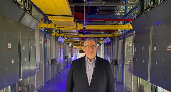 Christopher Kimm, senior vice president of Equinix's Americas operations, acknowledges "well-publicized concerns by residents," towards some projects, including buildings that brush up against houses and noise complaints. (Zachary Hansen/AJC)
